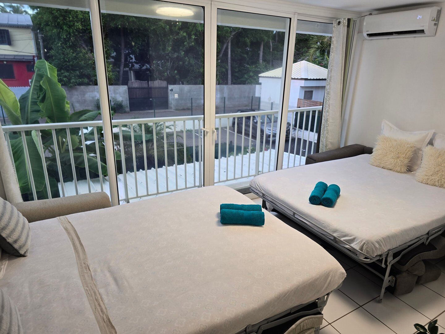 2 habitaciones, tabla de planchar con plancha y internet 