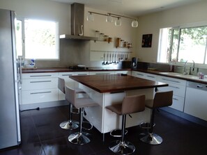 Private kitchen - Beautiful contemporary house with pool and pool house in a quiet village. (GOURBERA)