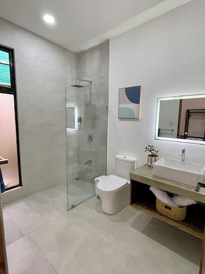 Shower, hair dryer, towels, soap