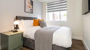 1 kamar tidur, setrika/meja setrika, Wi-Fi gratis, dan seprai linen