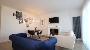 Deluxe Apartment, Balcony | Living area