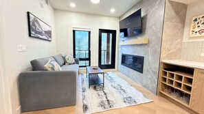 Living area - Canmore Peaks Retreat | Luxe 1BR w Pool & Gym (Canmore)