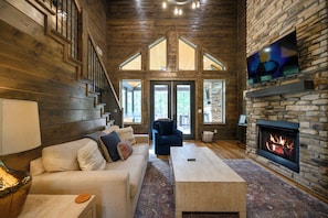 Smart TV, fireplace - Waterfront Hochatown Cabin with Hot Tub, Fishing, Fire Pit & Mountain Views! (Broken Bow)