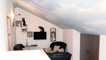 Apartment (Two Bedroom Apartment with Terrace an) | Living room | 32-inch flat-screen TV with cable channels