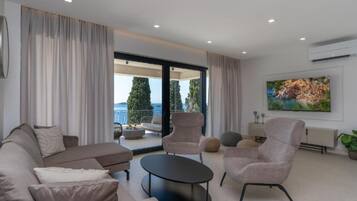 Villa (Five bedroom Villa with pool) | Living room | 32-inch flat-screen TV with digital channels