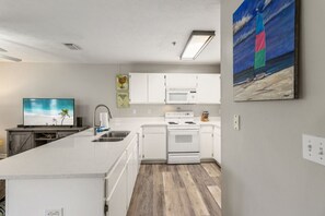 Fridge, microwave, stovetop, coffee/tea maker - Coastal Escape at Peachtree Place | 2BR Sleeps 8 | Near Beach & Attractions (Panama City Beach)