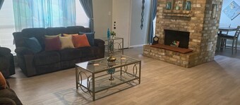 3-bedroom house in tranquil Missouri City with 2 rollaways and one twin ottoman.