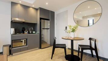 Fridge, microwave, stovetop, coffee/tea maker