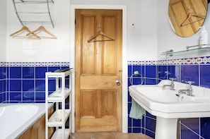 Shower, hair dryer, towels, toilet paper