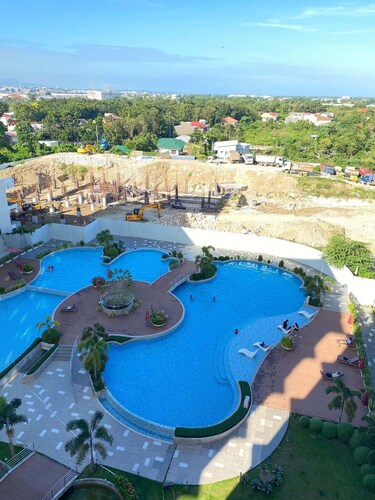 Cozy 1-bedroom condo in peaceful Lapu-Lapu with AC and gym access
