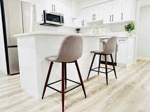 Unclassified image, 5 of 31, button - Modern 2 Bedroom Suite (Airdrie)