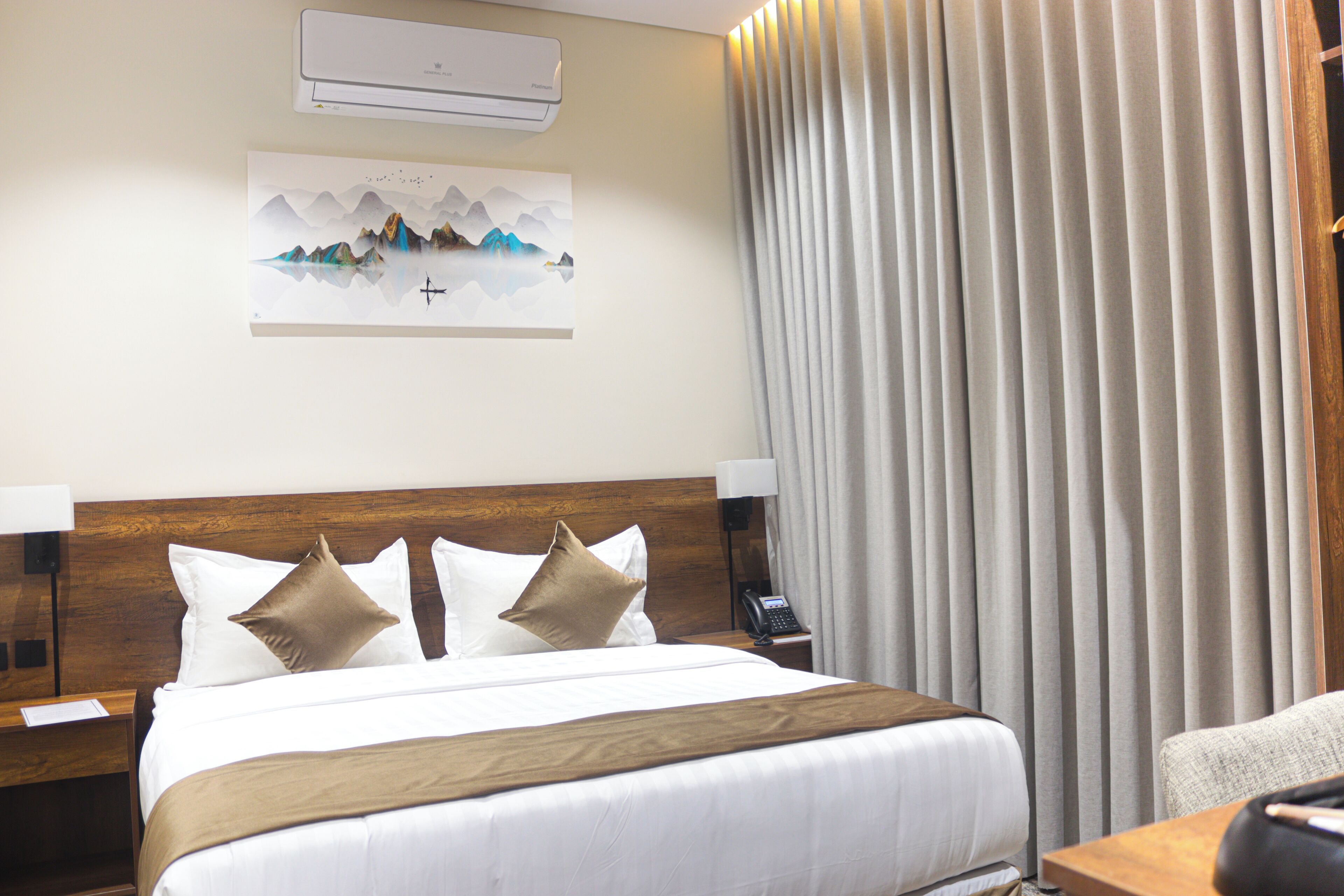 Premium bedding, blackout curtains, soundproofing, iron/ironing board