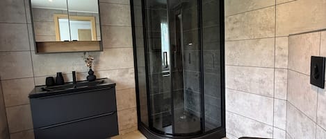 Shower, hair dryer, towels, soap