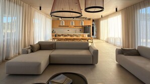 Een moderne woonkamer met een hoekbank, een eethoek met houten kasten en een keuken op de achtergrond.