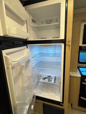 Unclassified image, 5 of 12, button - RV Park experience - Modern 2026 RV (Pompano Beach)