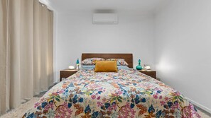 3 habitaciones, tabla de planchar con plancha y ropa de cama 