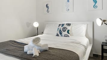 2 habitaciones, tabla de planchar con plancha, cuna de viaje y wifi