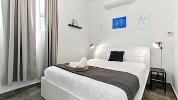 2 habitaciones, tabla de planchar con plancha, cuna de viaje y wifi