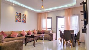 Deluxe Apartment, Pool View | Living area - Luxury Lovelystay in Cabo Huerto Del Rio (Cabo Negro)