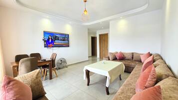 Deluxe Apartment, Pool View | Living area