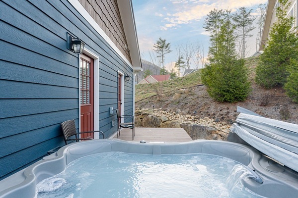 Private hot tub on the patio, located just outside the bedrooms.