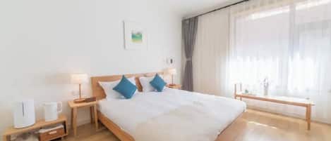 Family Suite | Minibar, blackout drapes, soundproofing, iron/ironing board