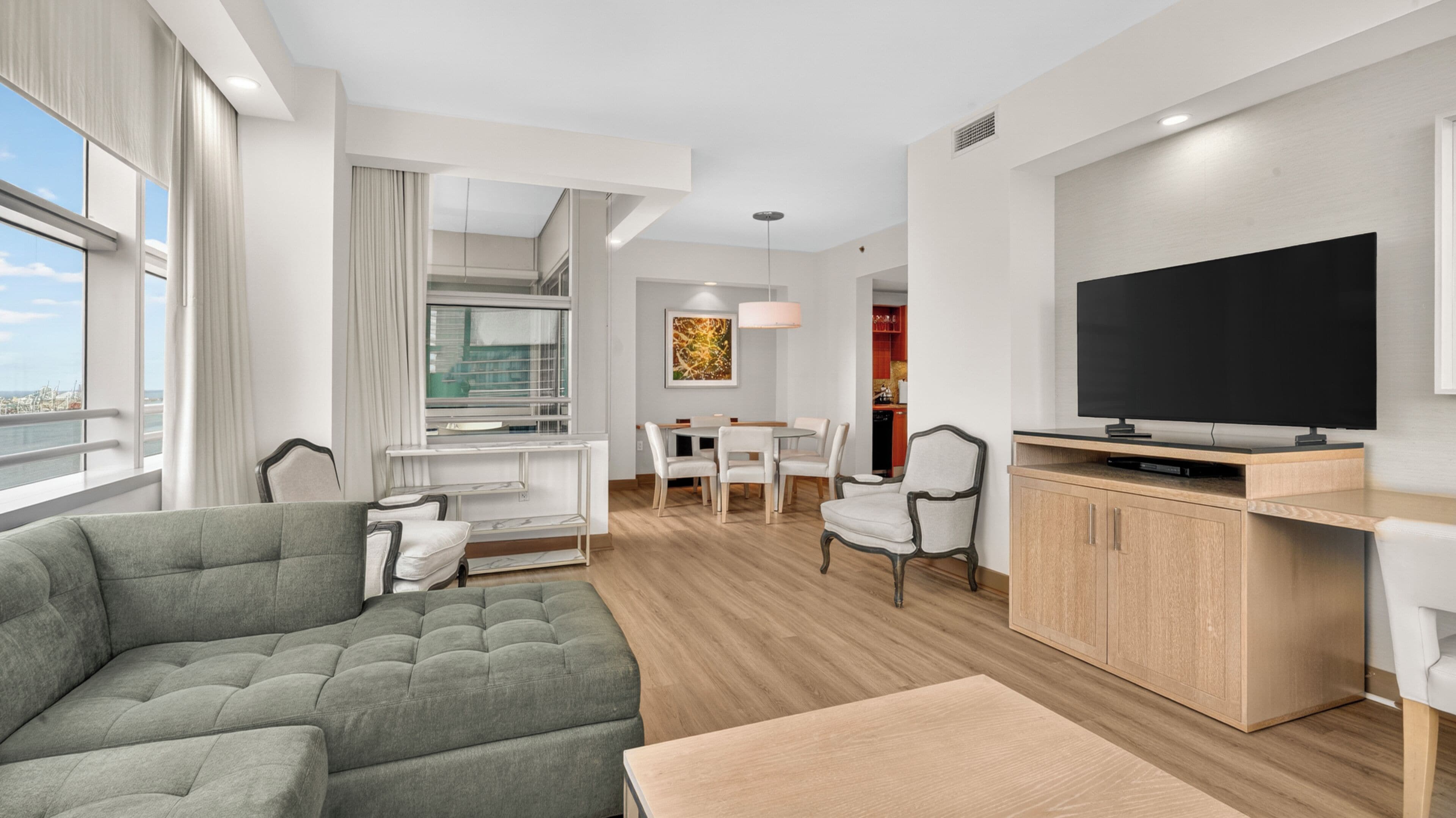 Luxury Suite, 2 Bedrooms, Balcony, Ocean View | Living area | 55-inch Smart TV with satellite channels, Netflix, streaming services