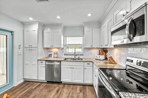 Fridge, microwave, oven, stovetop - Sandy Feet Retreat | Pool, Spa, Steps to Siesta Beach & Village (Sarasota)
