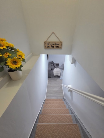 Interior. Cozy 1-king size bedroom house in quiet Waterbury with 75" TV in your bedroom.