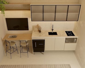 Réfrigérateur, micro-ondes, plaque de cuisson, cafetiÚre/bouilloire