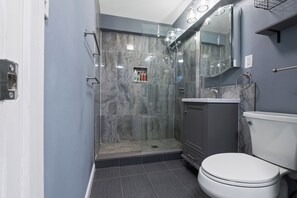 Shower, hair dryer, towels, soap