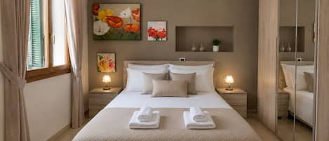 1 habitación, tabla de planchar con plancha, wifi y ropa de cama