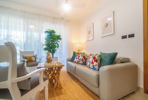 Living area - Modern 2BR Condo in Dominicus,  Pools & Near Beach (Dominicus)