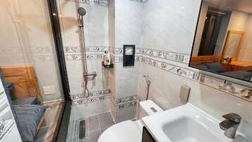 Basic House, Balcony, Mountain View | Bathroom | Shower, free toiletries, hair dryer, slippers