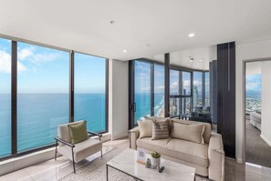TV, offices - The Panorama - NEW Beachfront 2BR Corner Ocean View with Parking, Pool and GYM (Surfers Paradise)