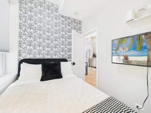 Iron/ironing board, travel crib, WiFi (free), bed sheets