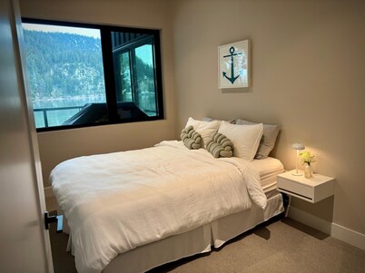 Modern house on the Lake with stunning view and private beach and dock!