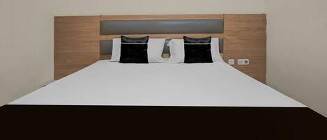 Deluxe-sviitti | Työpöytä, ilmainen Wi-Fi, vuodevaatteet