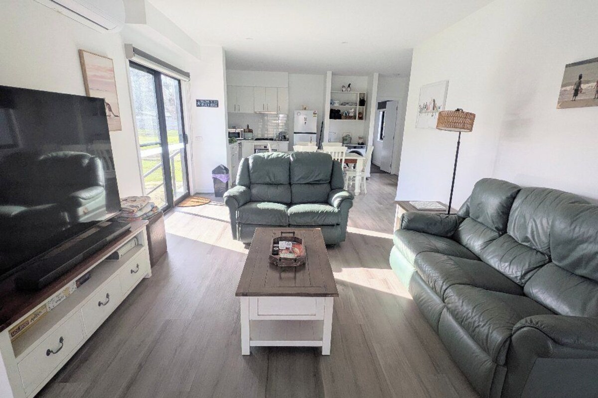 Deluxe House, Non Smoking, Balcony | Living area | 65-inch flat-screen TV with digital channels