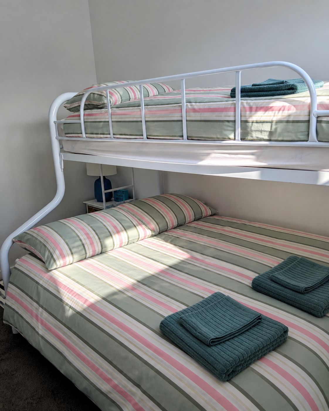 A bunk bed with a lower bed and a top bunk.