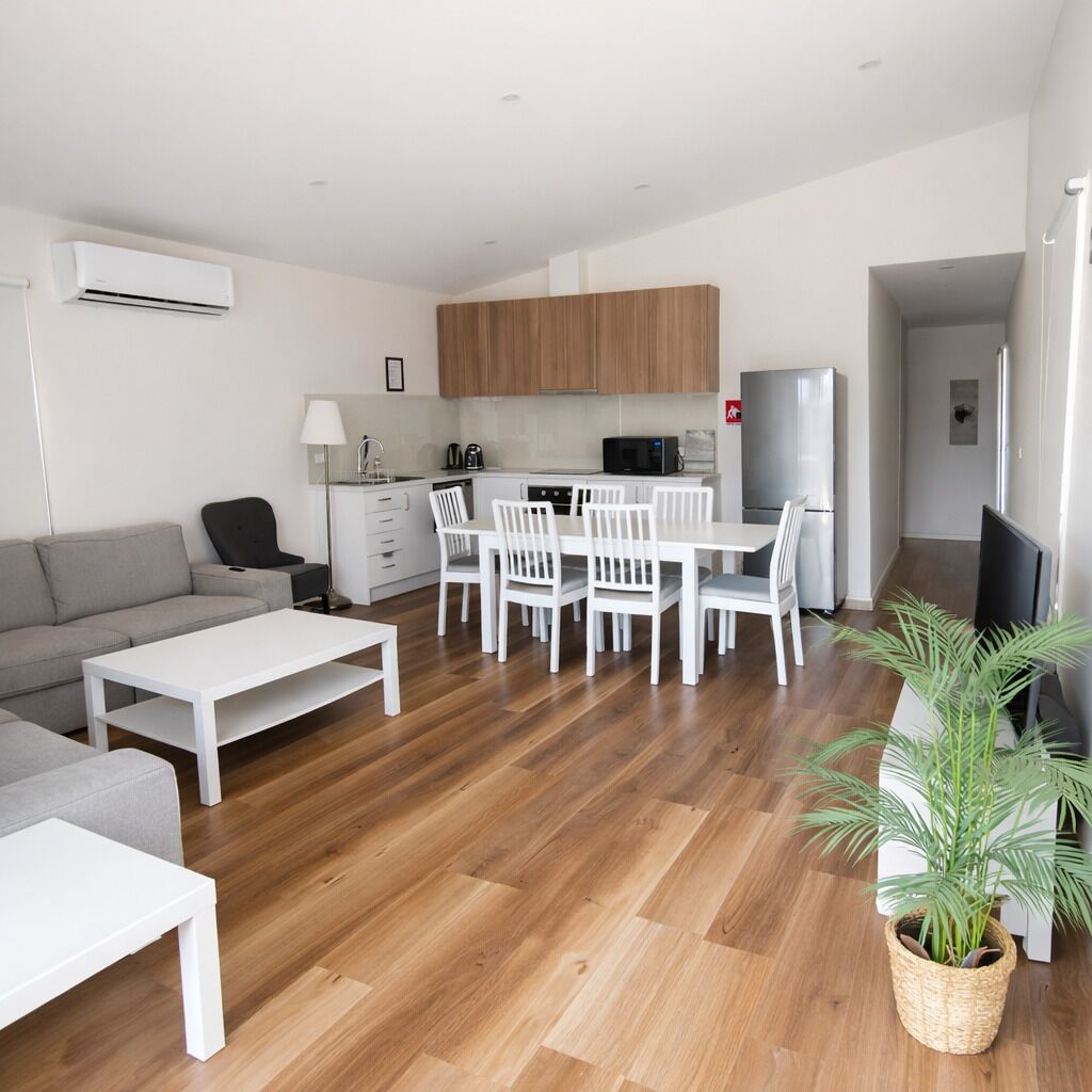 Deluxe Cabin, 3 Bedrooms | Living area