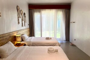 Habitación con 1 cama doble o 2 individuales, vistas al jardín | Wifi gratis