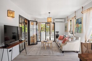 Luxury Villa, City View | Living area | 50-inch LCD TV with digital channels - Casa Uno (San Juan)
