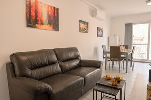 Family Apartment, Multiple Bedrooms (Camelia Seaview 1 Bd Apart In St Paul) | Living area | 21-inch TV with digital channels - Camelia Seaview 1 Bd Apart In St Paul Bay (St. Paul's Bay)