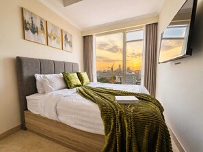 Apartemen, 2 kamar tidur, pemandangan kota | Setrika/meja setrika dan Wi-Fi gratis