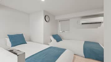 Apartment, 1 Bedroom, Non Smoking, Private Bathroom | Blackout drapes, iron/ironing board, free WiFi, bed sheets