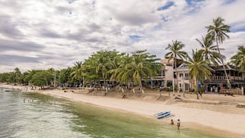 On the beach, white sand