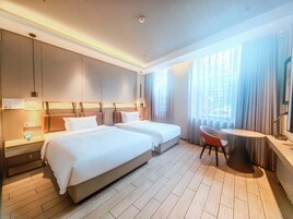 Blackout drapes, soundproofing, iron/ironing board, free WiFi