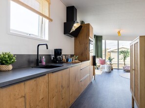 Microwave, stovetop, dishwasher, coffee/tea maker