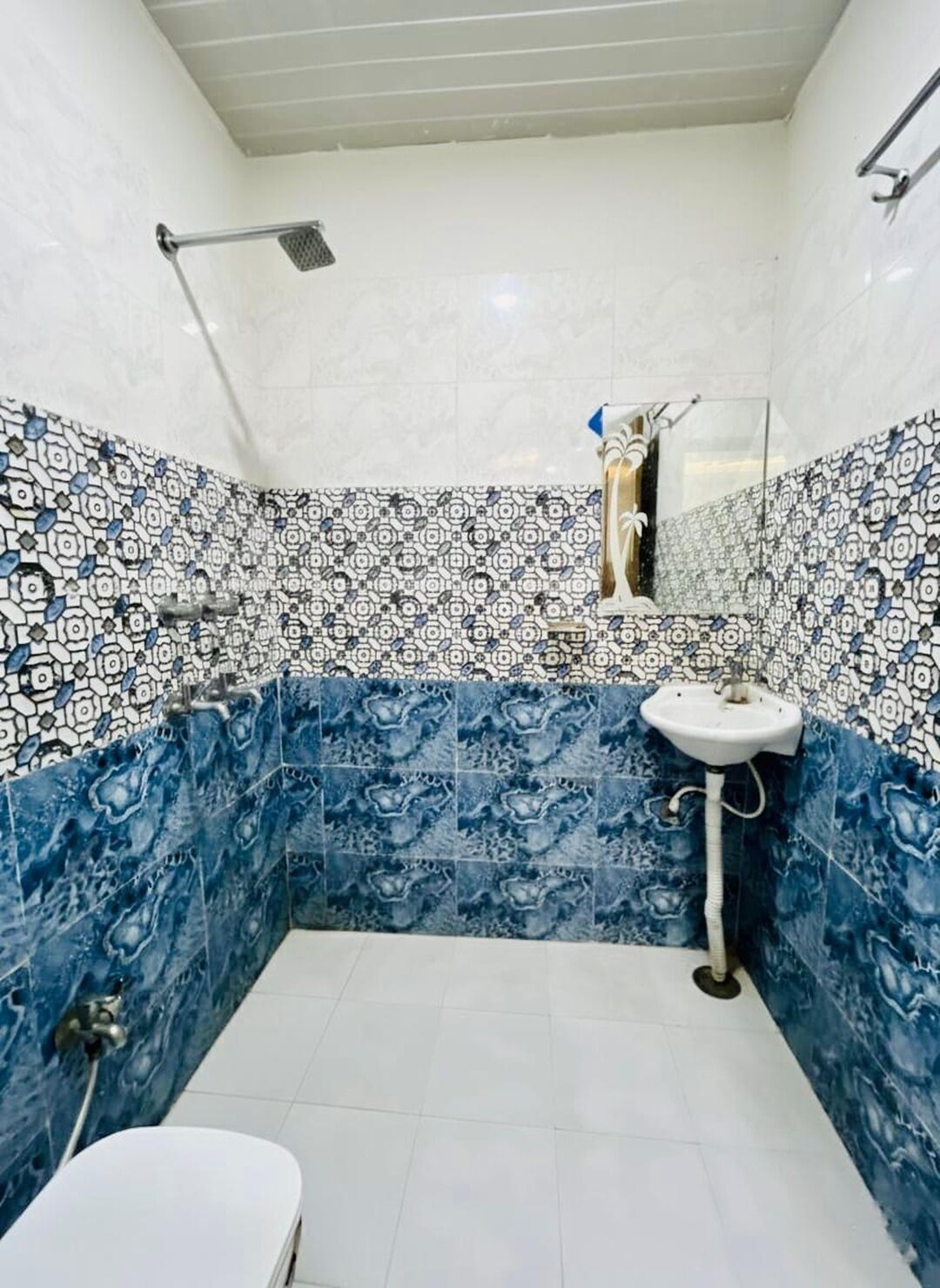Chambre Deluxe, climatisation | Salle de bain | Serviettes fournies